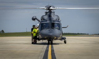 Maintainers talk with the MH-139 Grey Wolf’s aircrew prior to a flight Aug. 17 at Eglin Air Force Base, Fla.  The Grey Wolf sortie was the first flight since the Air Force took over ownership of the aircraft Aug. 10.  It also marked the first all-Air Force personnel flight as well in the Air Force’s newest helicopter.  (U.S. Air Force photo/Samuel King Jr.)