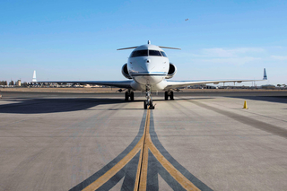 A 430th Expeditionary Electronic Combat Squadron E-11A outfitted with a Battlefield Airborne Communications Node sits on the runway at Kandahar Airfield, Afghanistan, Nov. 16, 2018. The payload allows command and control to get in contact with the troops on the ground to enable the mission accomplishment. (U.S. Air Force photo by Senior Airman Kaylee Dubois)